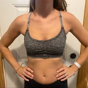 No padding / no push-up. Compression sports bra. Lightly worn.